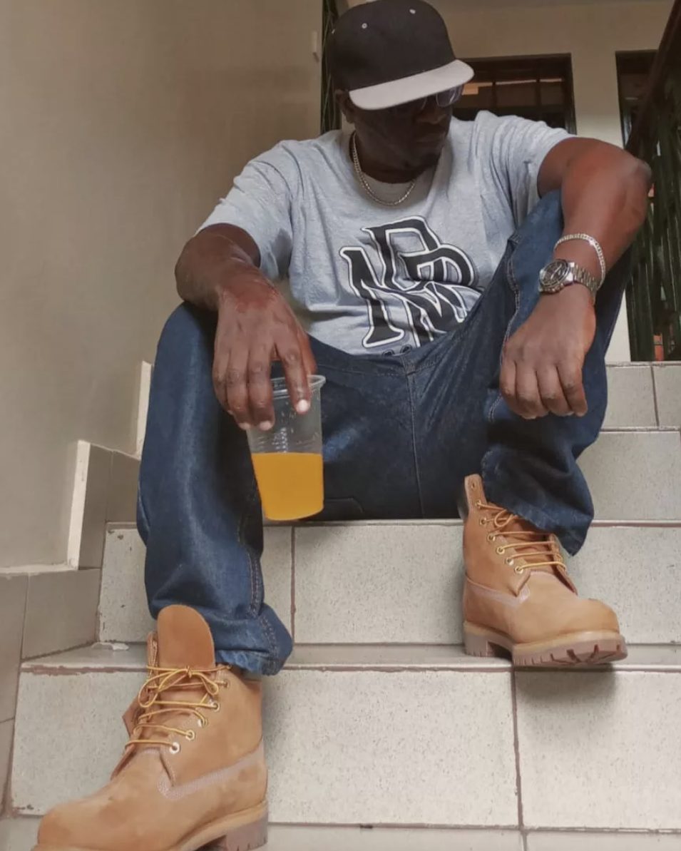 Solodified in the grey NBB tee and Timberlands
